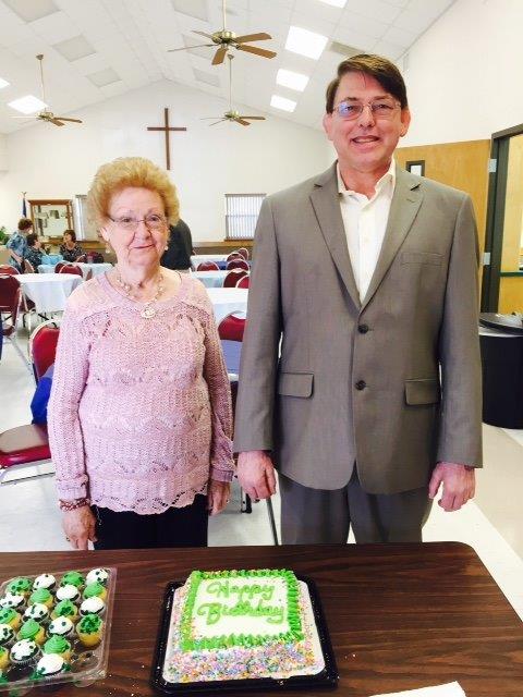 Annie Mae Korenek and John Geiger are getting ready to cut their join birthday cake for a birthday celebration in the Fellowship Hall March 6.  Sheila Johnson provided the special cake and matching cupcakes.