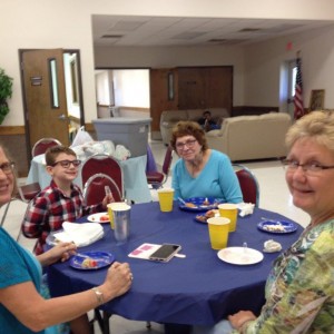 l to r:  Becky Jungklaus, Dylan Brzozowski, Peggy Spitzenberger, and Cheryl Davis relishing the good desserts at our Palm Sunday dinner.