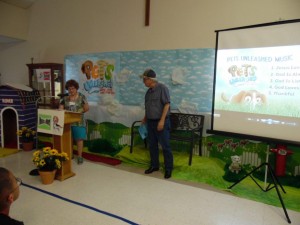 Jan Johnson as German Shepherd in a comedy skit with Peggy Spitzenberger during Vacation Bible School.