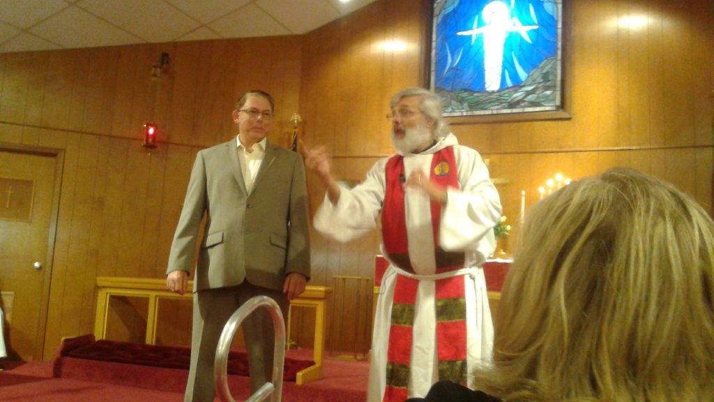 Rev. Reinke has John Geiger portray a deaf man during his  Mission Festival sermon. 